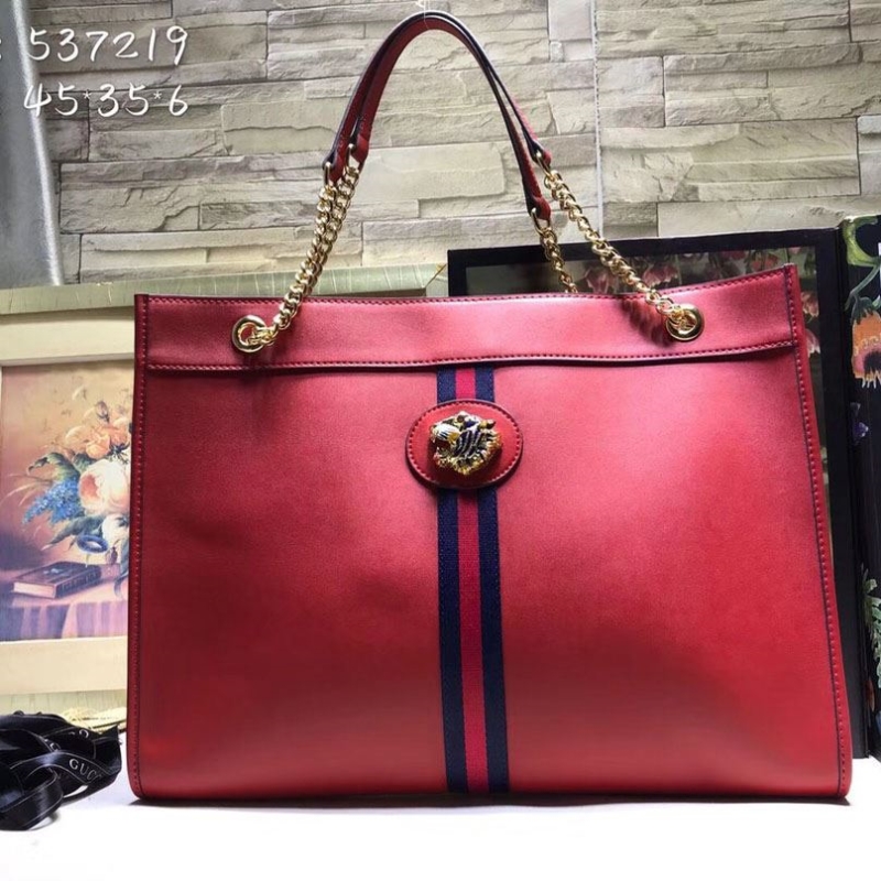 G*u*i shopping bags